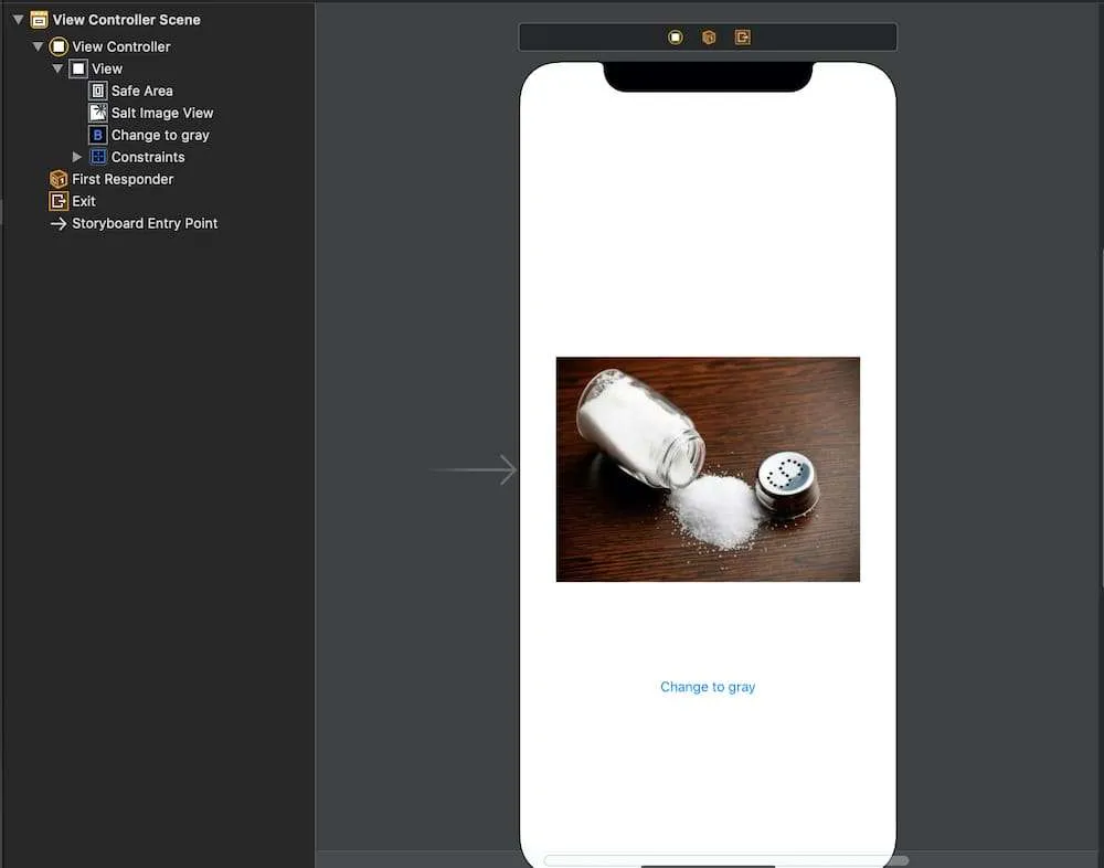 The storyboard’s View Controller Scene: an iPhone screen with a photo of a spilled salt shaker in the Salt Image View and a “Change to gray” button below it.